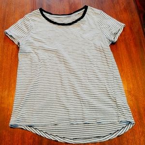 Girls size 10-12 Old Navy black and white striped scoop neck tee.